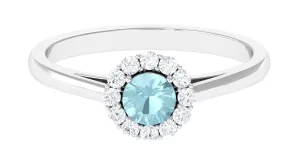 1 CT Sky Blue Topaz and Diamond Floating Halo Engagement Ring