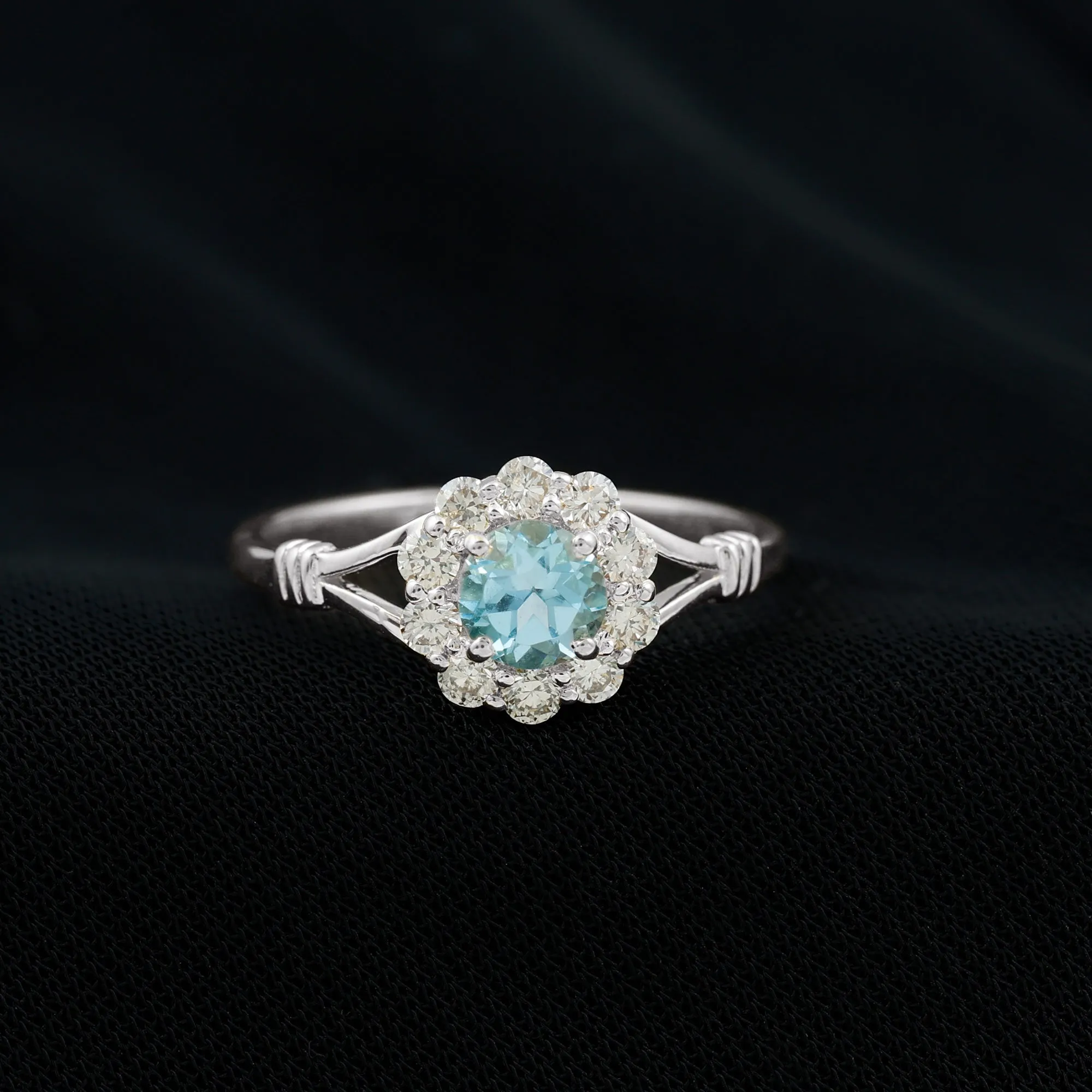 1 CT Swiss Blue Topaz and Diamond Halo Split Shank Ring