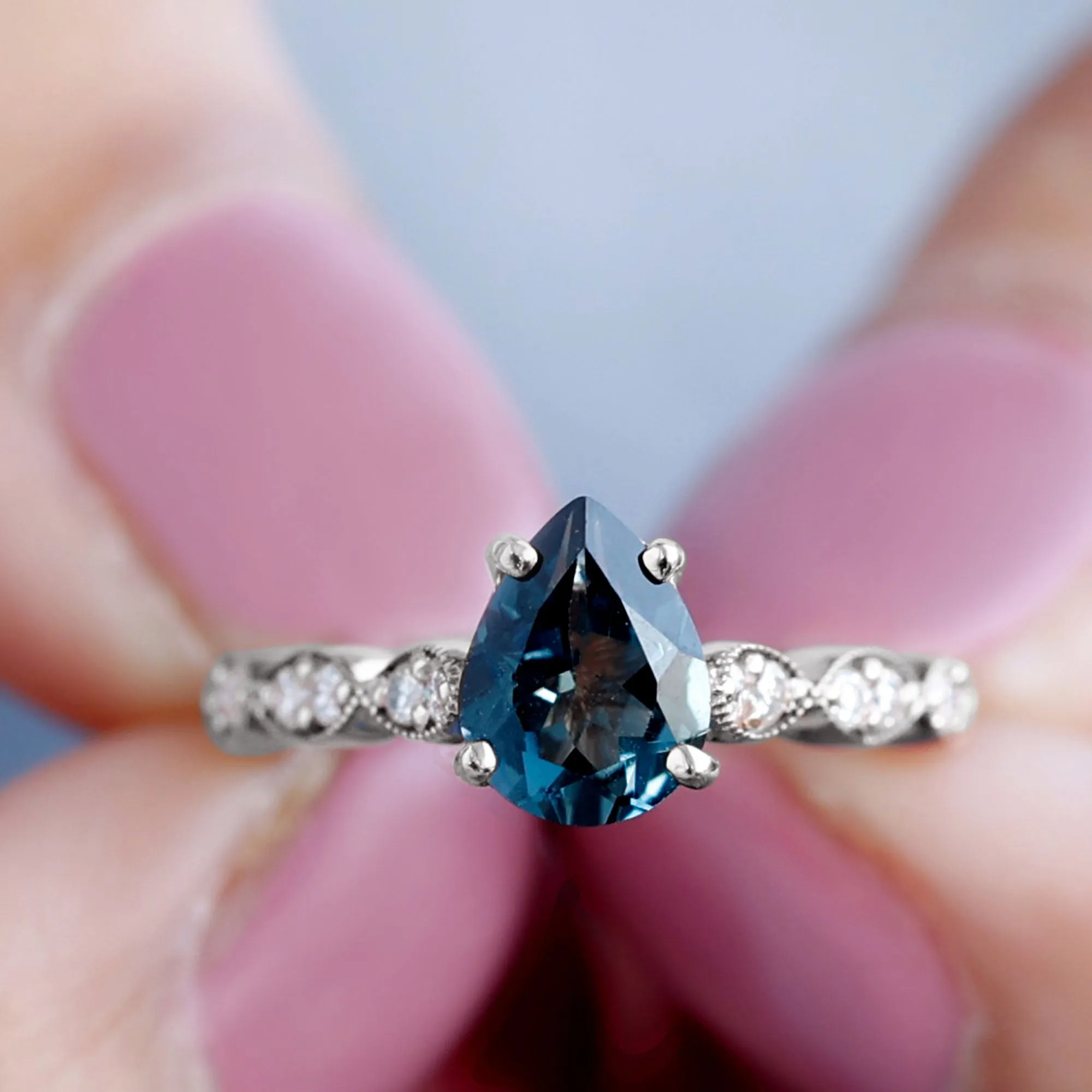 1.25 CT Teardrop London Blue Topaz Solitaire Ring with Diamond