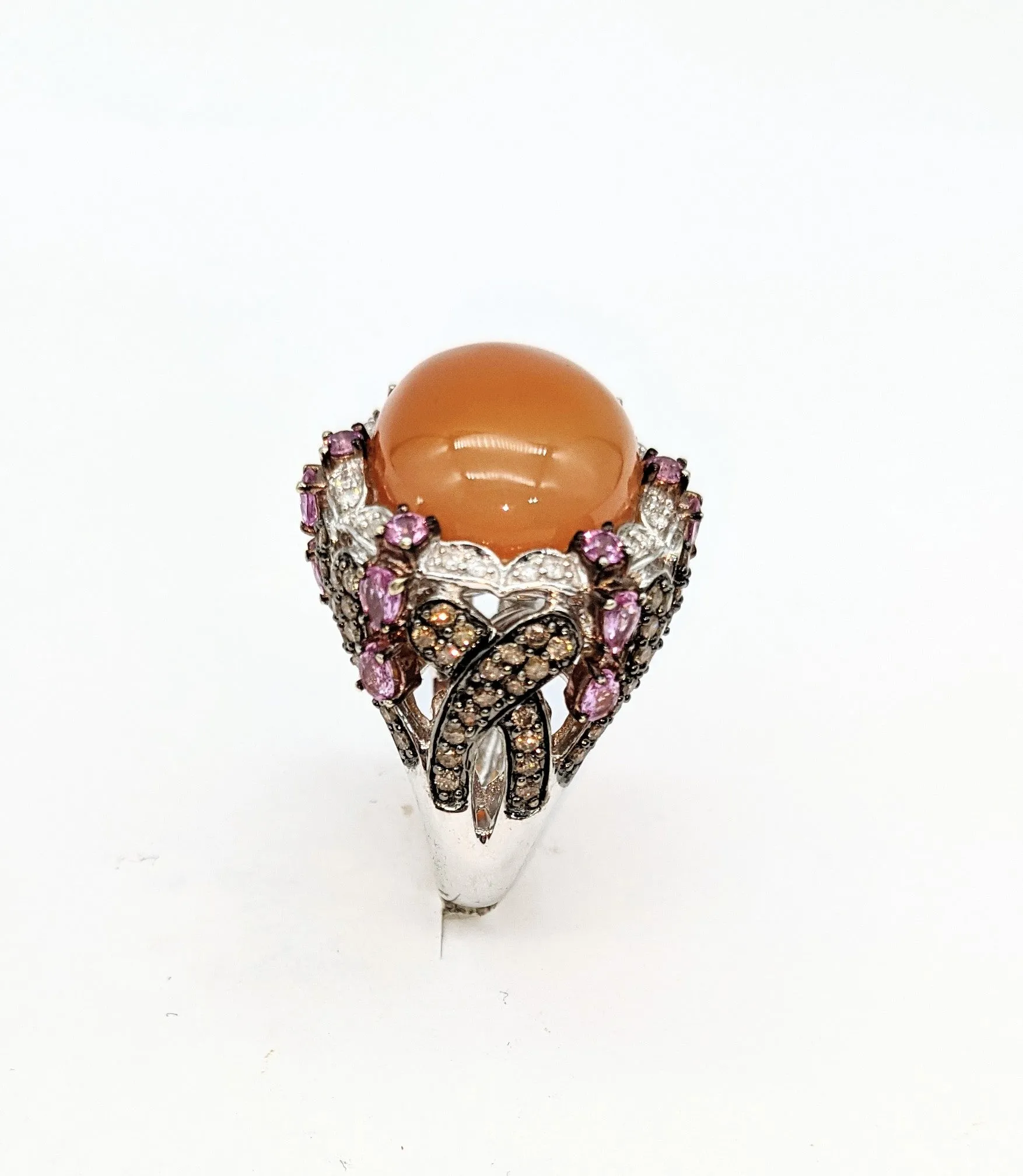 14 karat white gold with 1.65 carat total weight in diamonds pale orange ombre cabachon stone ring