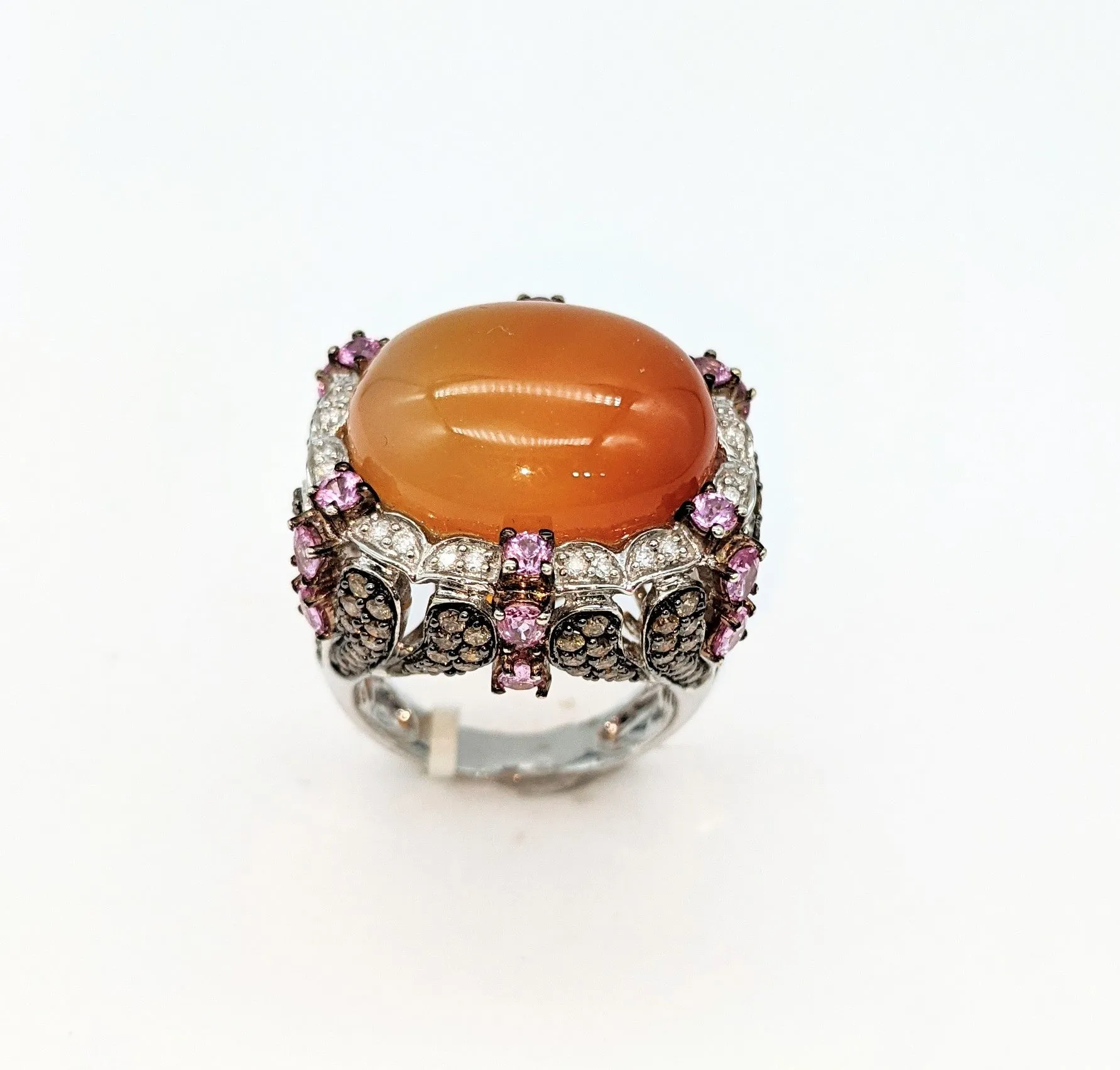 14 karat white gold with 1.65 carat total weight in diamonds pale orange ombre cabachon stone ring