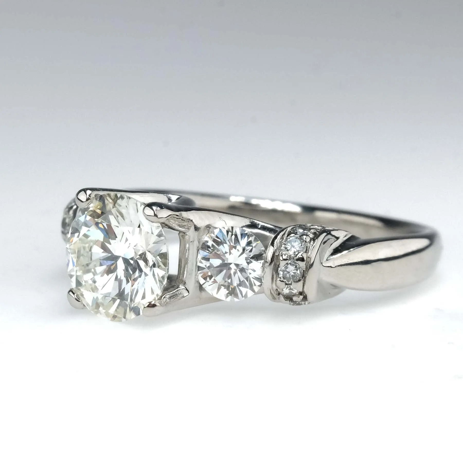 GIA 1.54ct VS2/J Round Diamond Three Stone Engagement Ring in Platinum