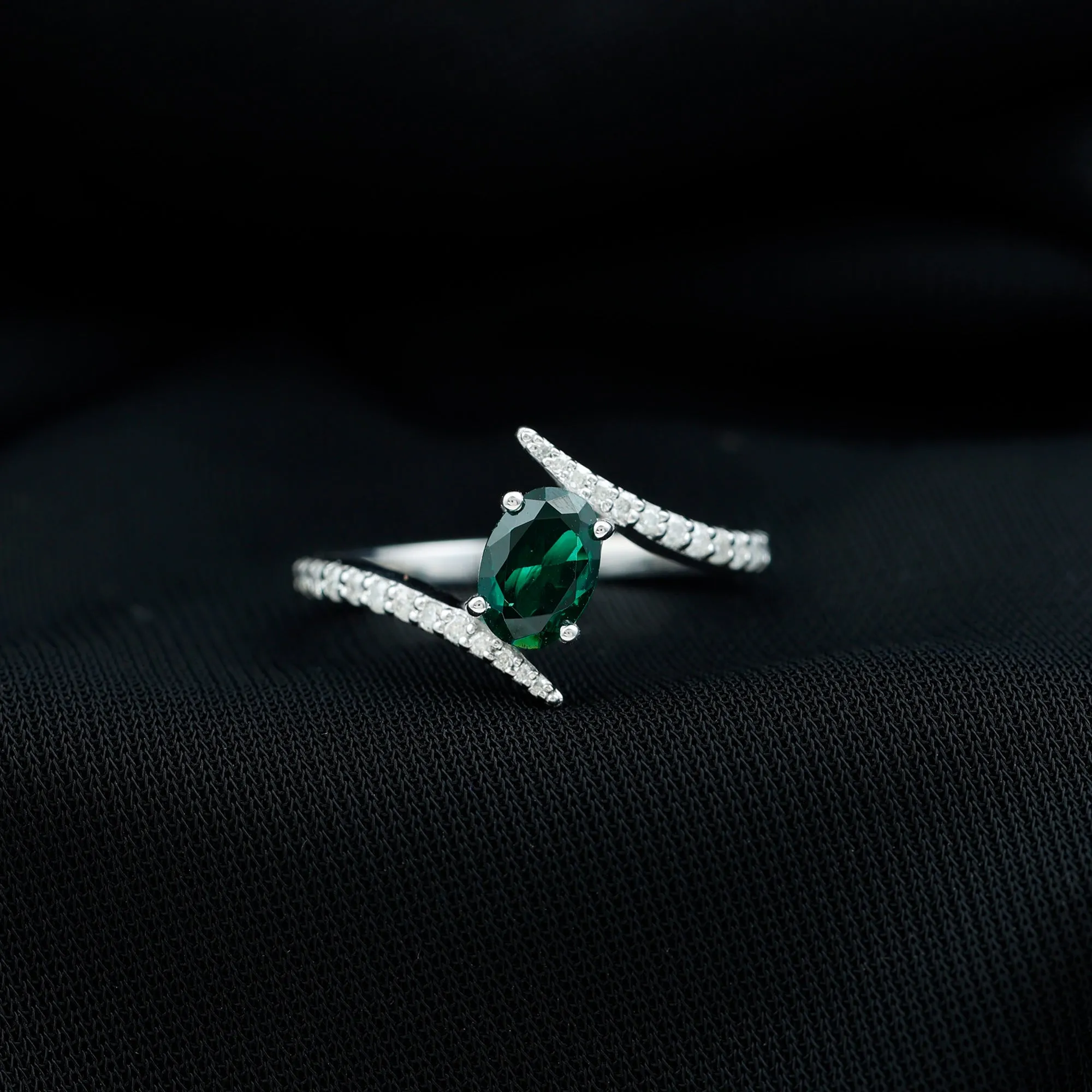 Oval Shape Lab Grown Emerald Solitaire Bypass Ring with Moissanite