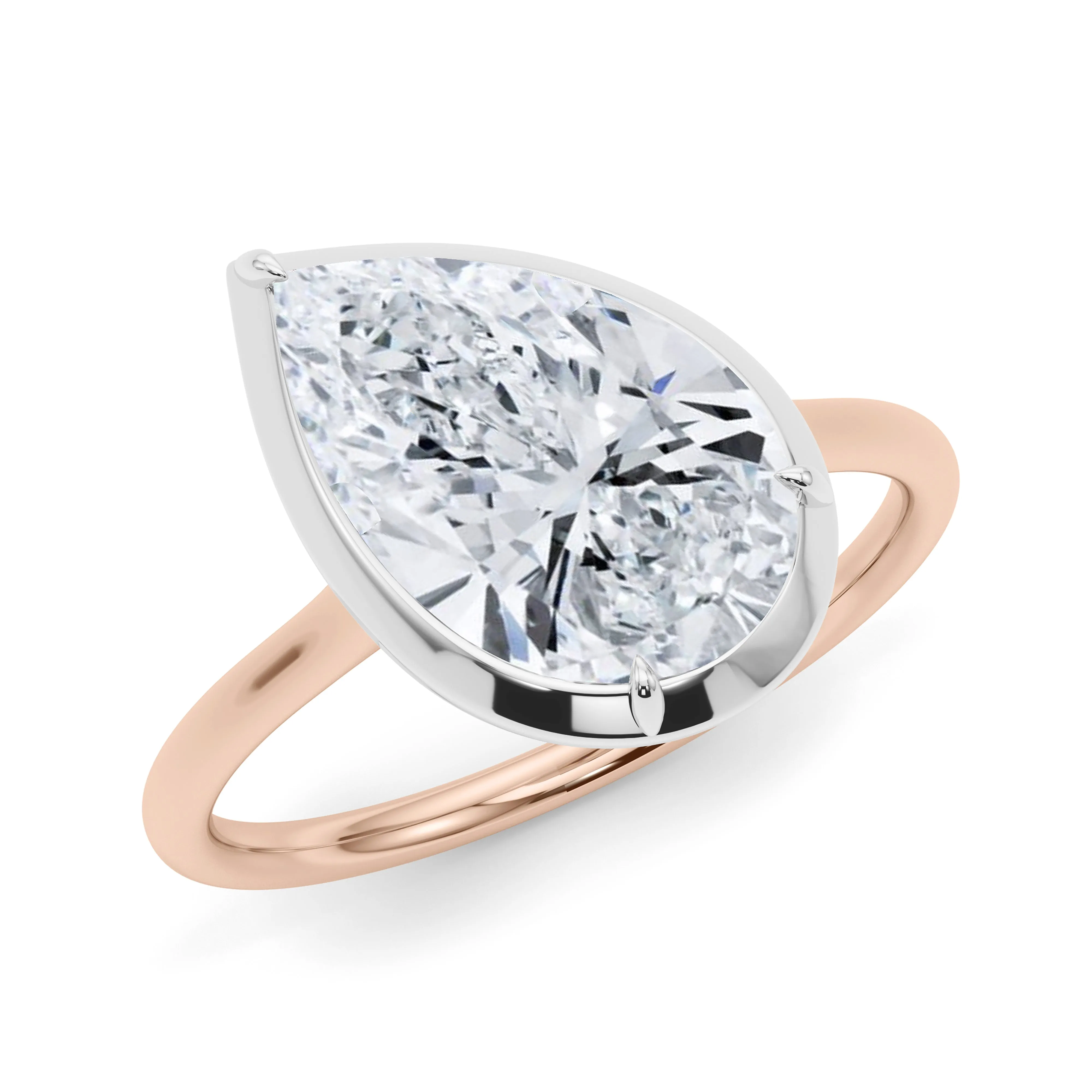 Two-Tone Tilted Pear Diamond Ring