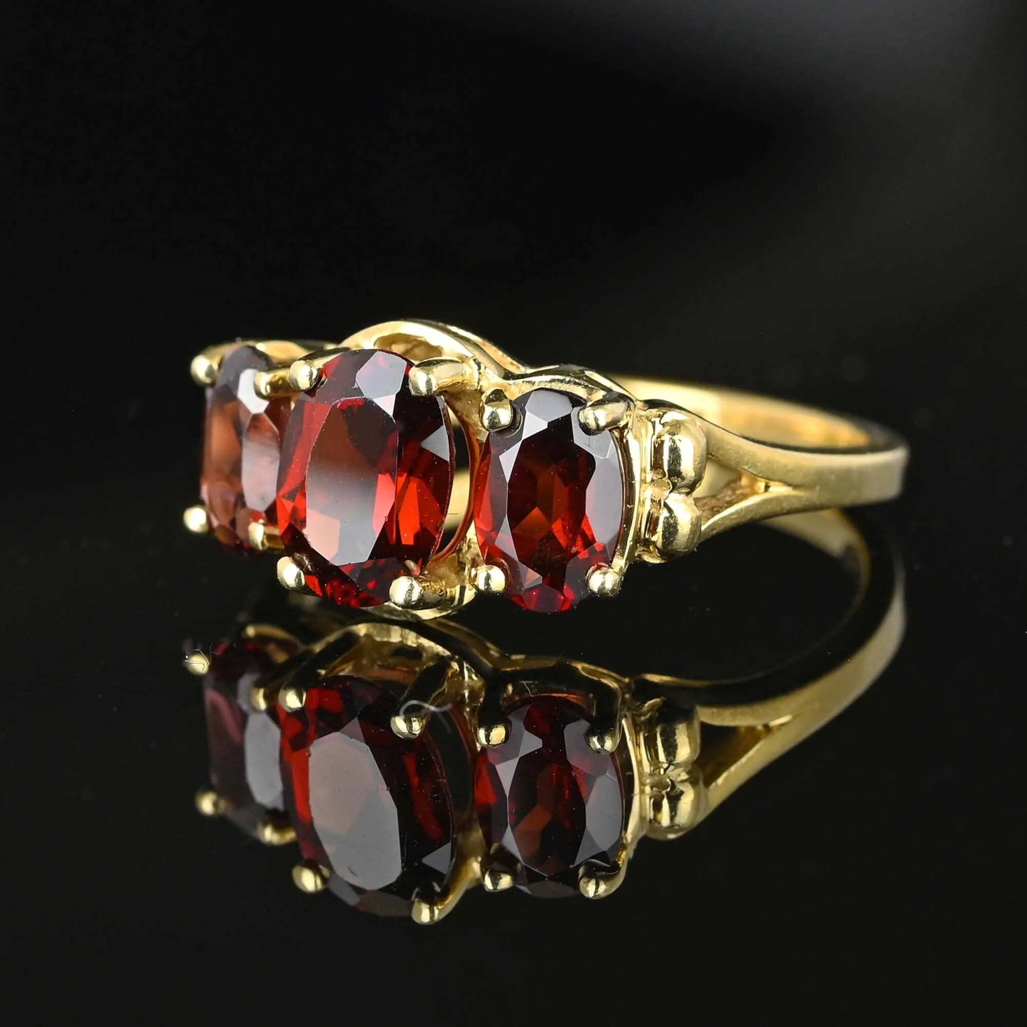 Vintage Gold Trilogy Three Stone Garnet Ring