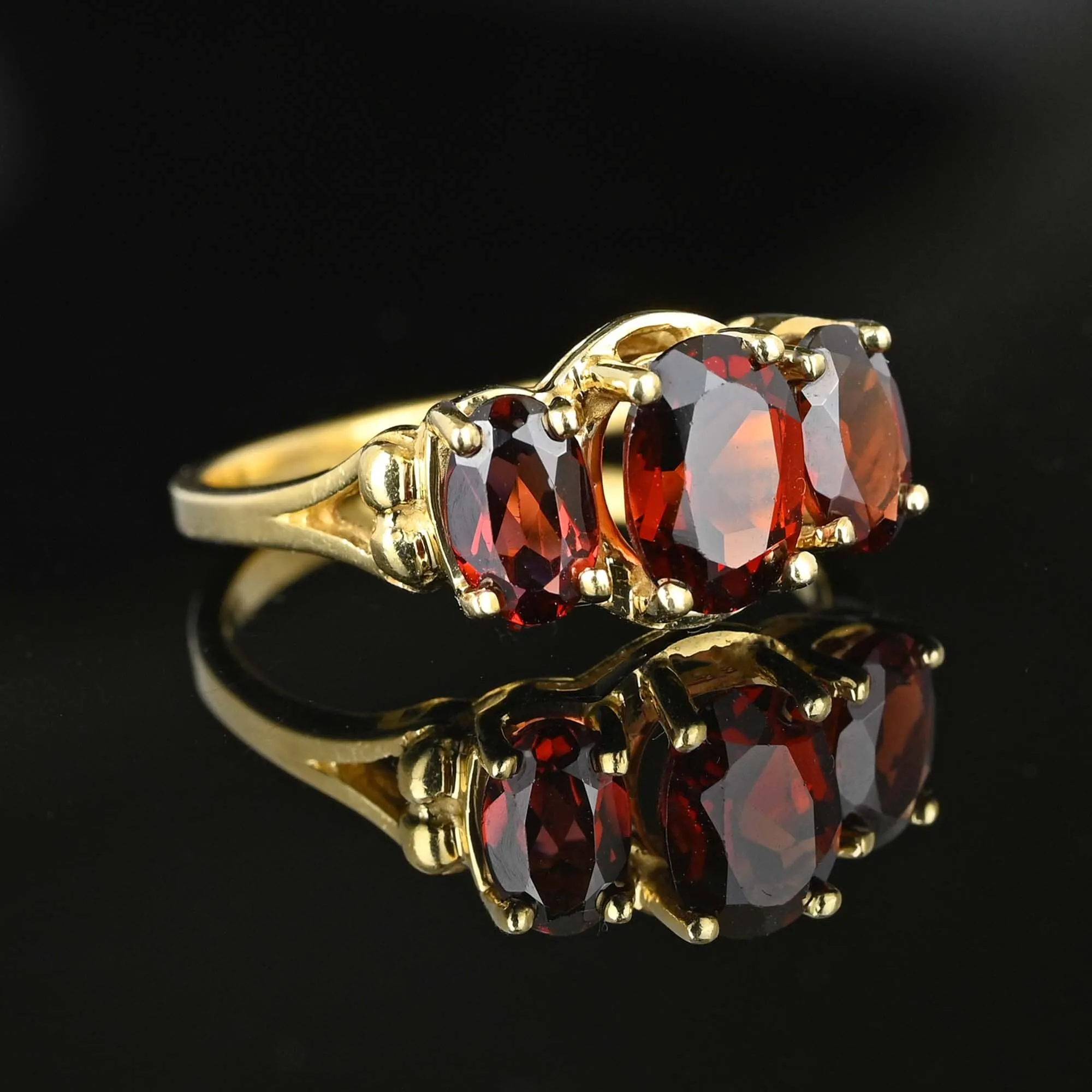 Vintage Gold Trilogy Three Stone Garnet Ring