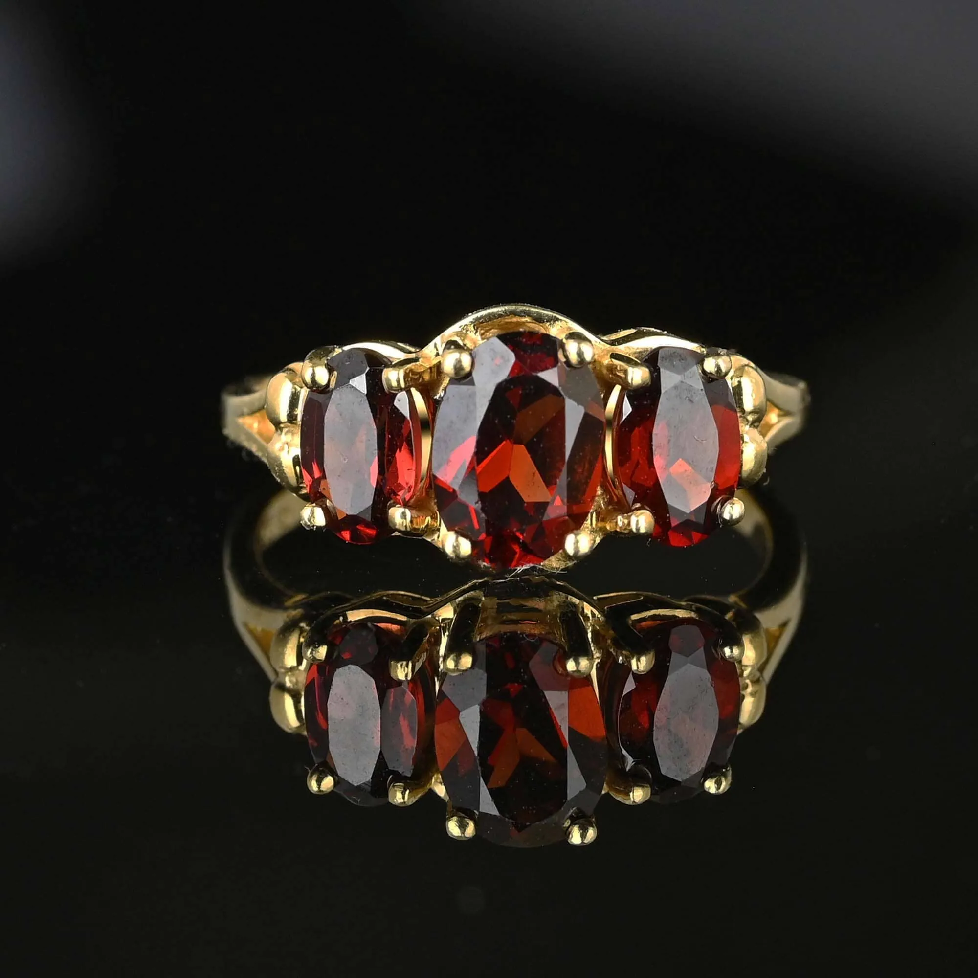 Vintage Gold Trilogy Three Stone Garnet Ring