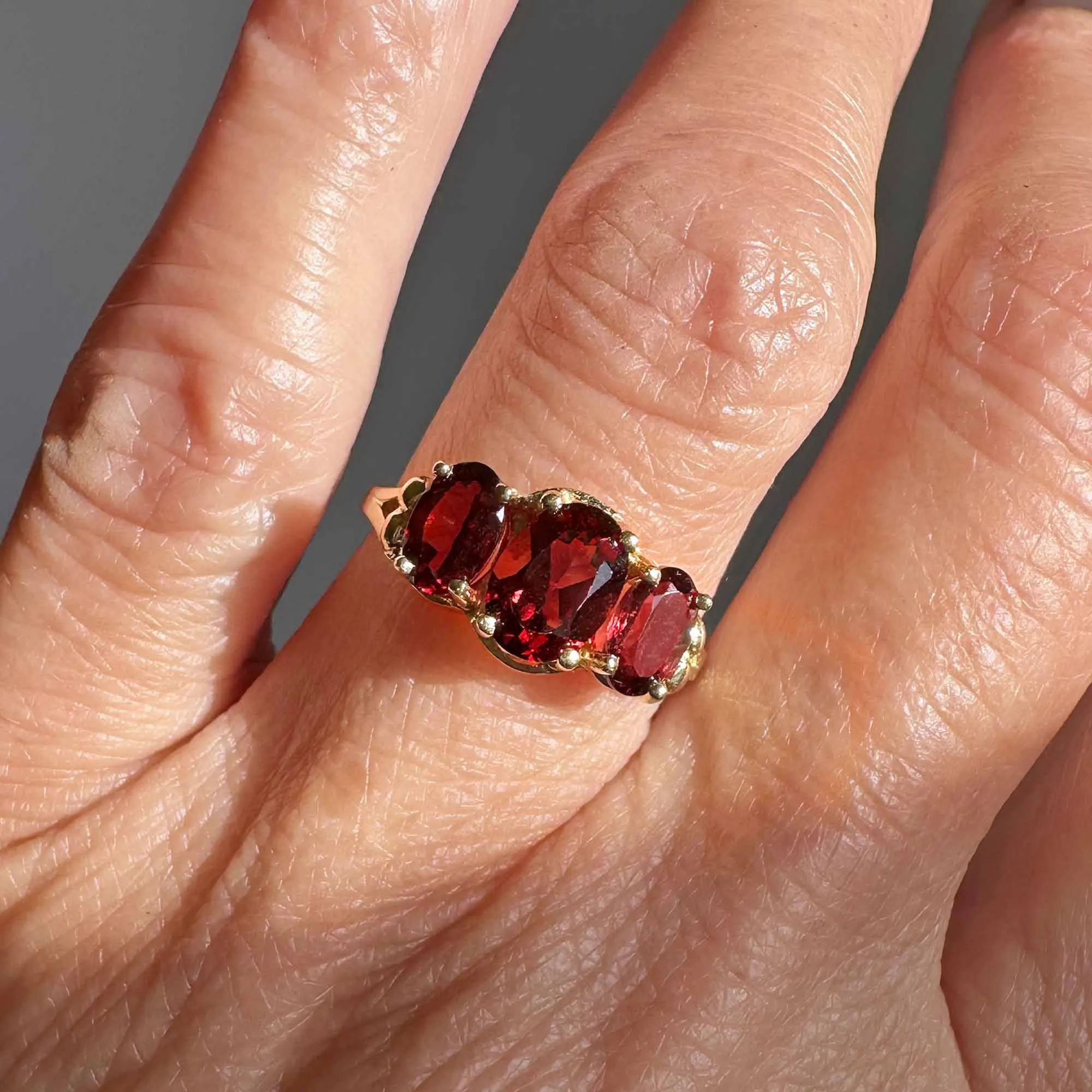 Vintage Gold Trilogy Three Stone Garnet Ring