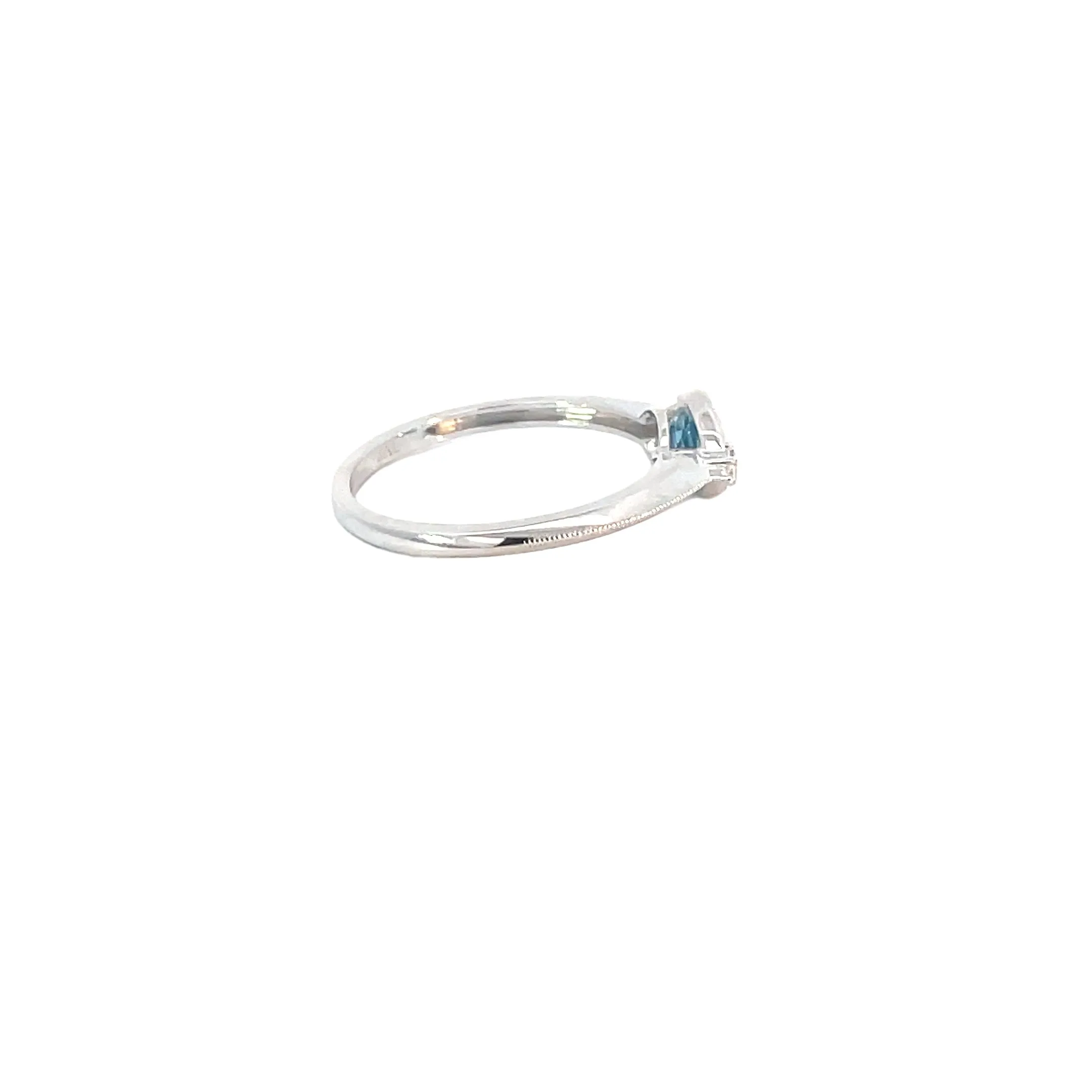 White Gold Blue Topaz Ring